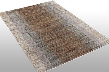 A rug of Moroccan,, ca 235 x 167 cm.