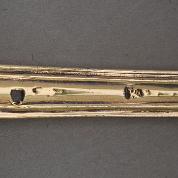 A five piece set of silver-gilt travel-cutlery, unidentifiable makers mark, Paris 1798-1809, in original box.