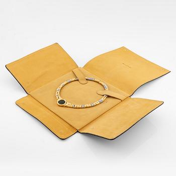 A Bulgari necklace "Monete" in 18K gold with an ancient coin.