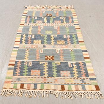 A Swedish flat weave carpet 212x114 cm.