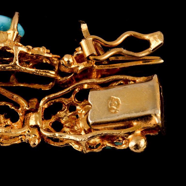ARMLÄNK, 18k guld med 11 cabochonslipade turkoser, utländska stämplar. Vikt 20 g.