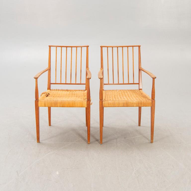 A pair of Josef Frank mahogany and rattan armchairs model nr 508 firma Svenskt Tenn mid 1900s.