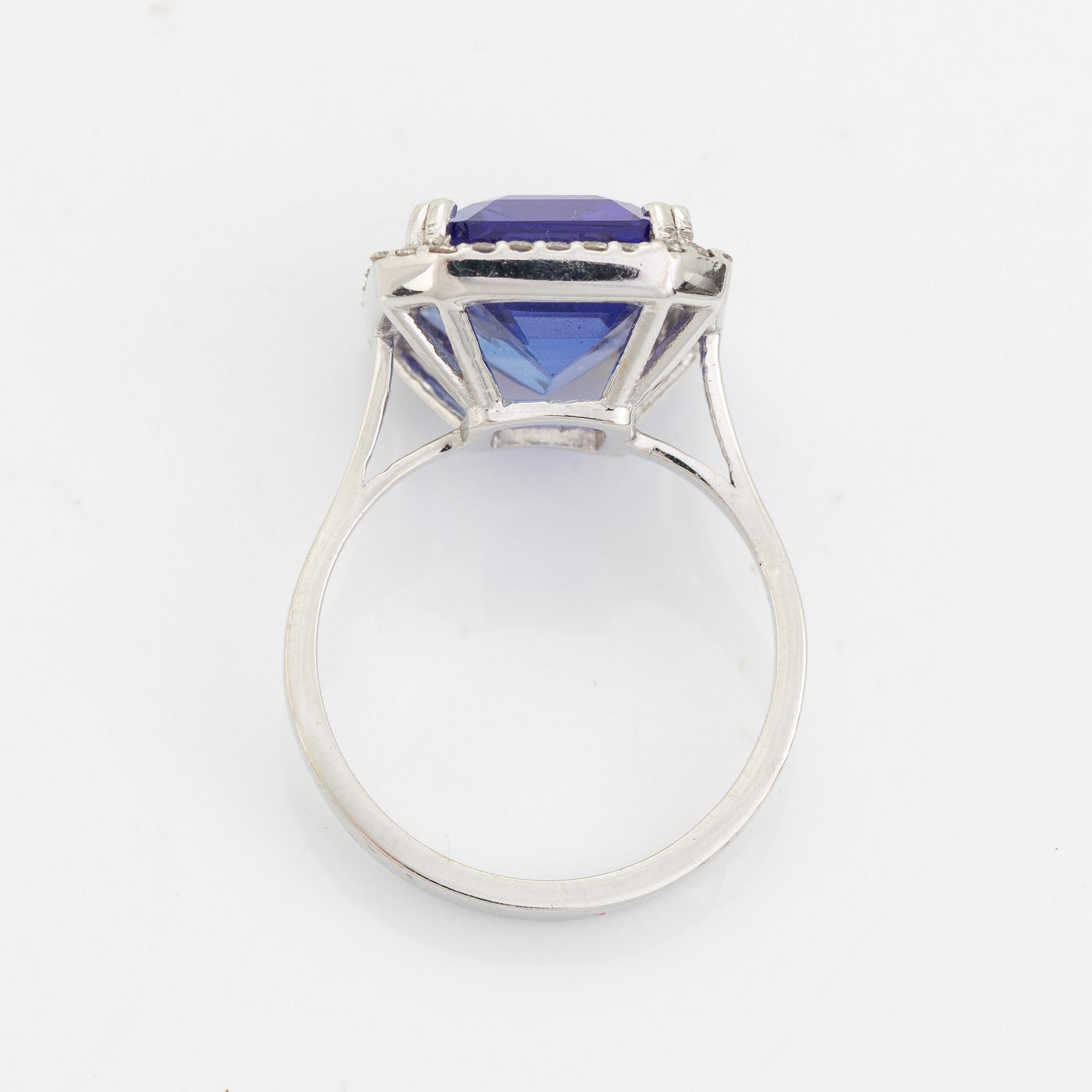 Emerald cut tanzanite and brilliant cut diamond cocktail ring.