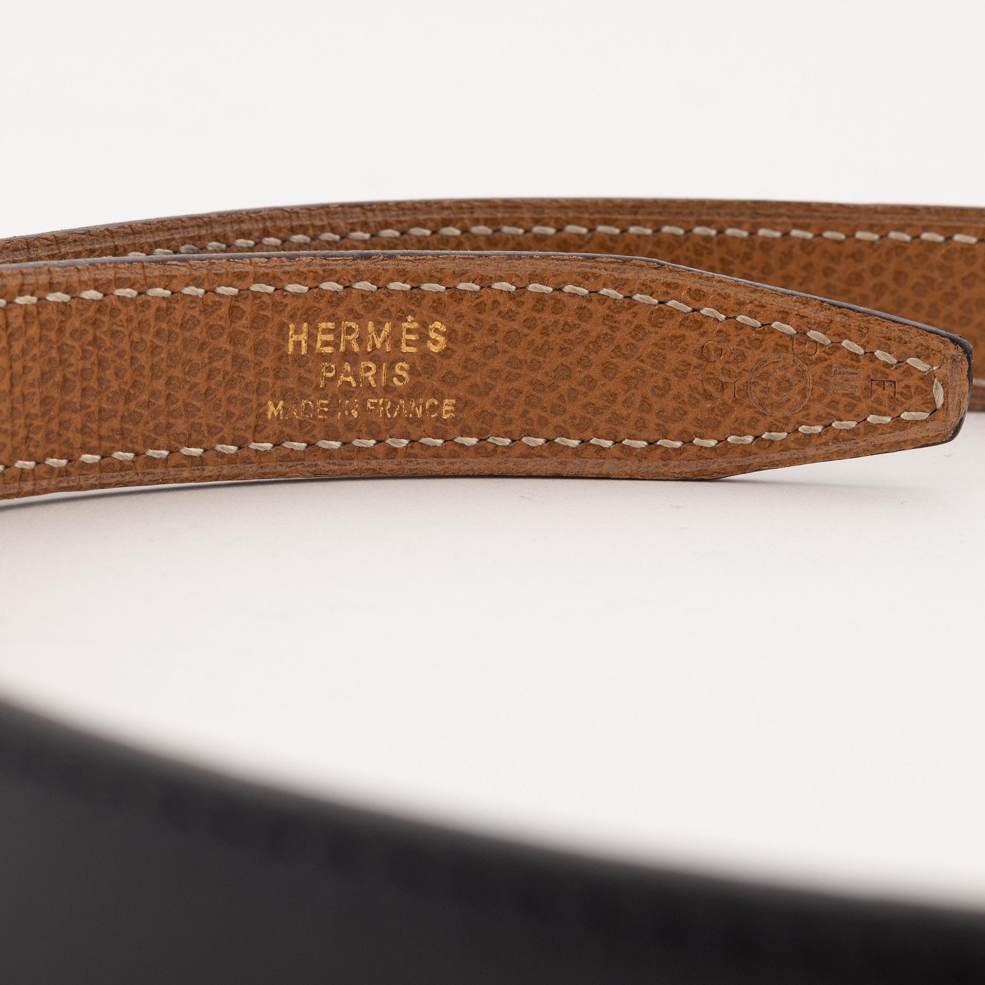 Hermès, a 'Constance' reversible leather belt, size 65, 1985.