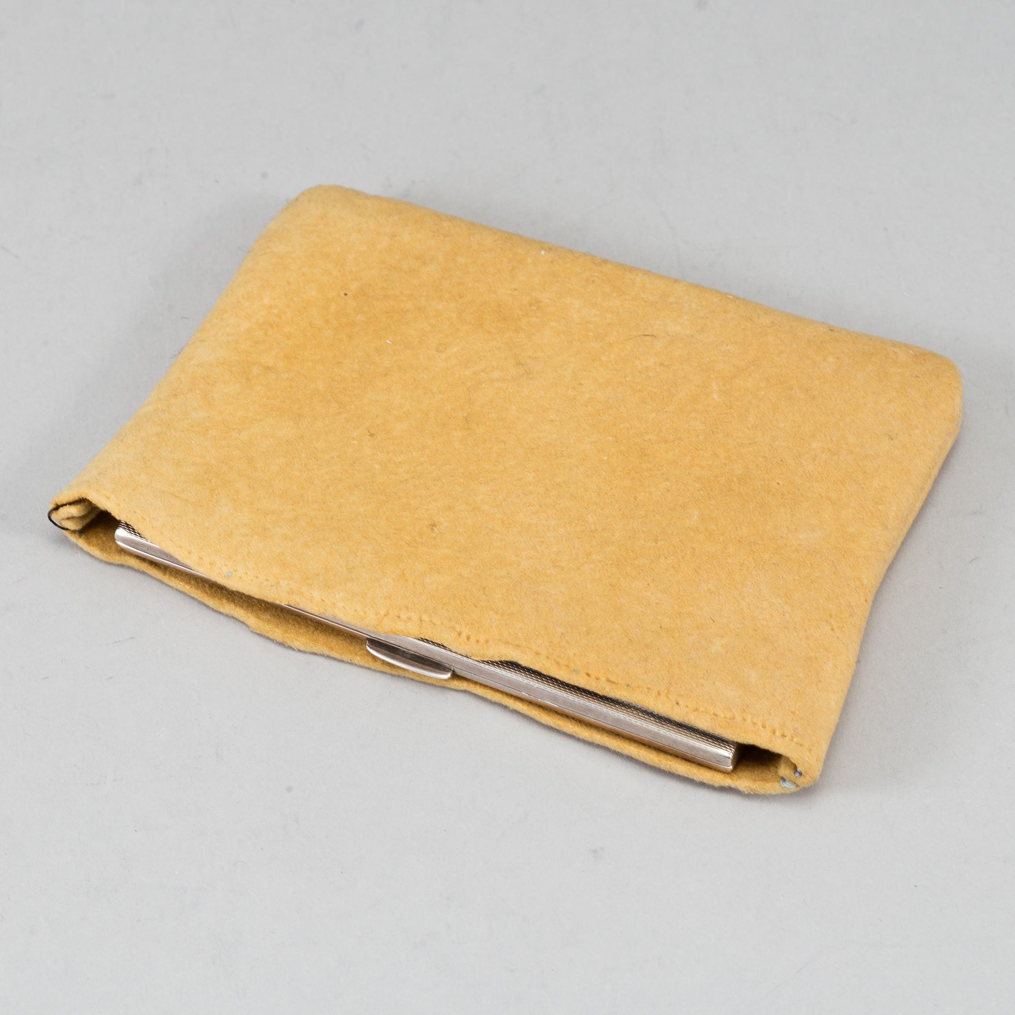A sterling silver cigarette-case, made in 1935 by Dingley (or Davies) Brothers, Birmingham, England.