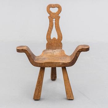A STOOL, oak, early 20th century.