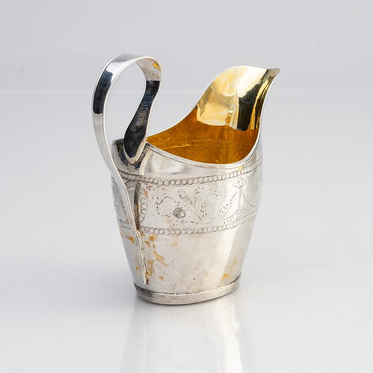 A Swedish early 19th century parcel-gilt silver cream-jug, mark of Johan Samuel Gottfrid Lange, Växjö 1815.