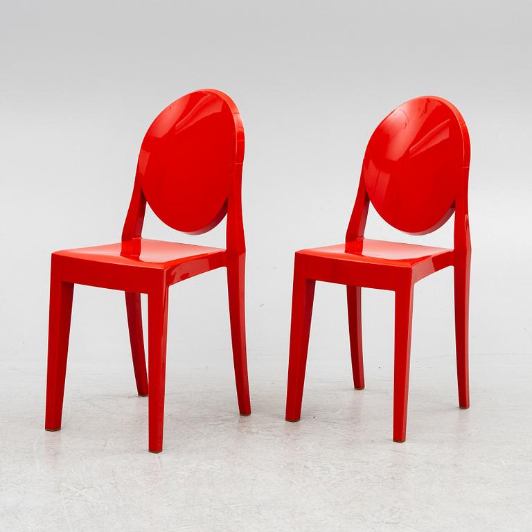 Philippe Starck, a pair of red chairs, "Victoria Ghost", Kartell.