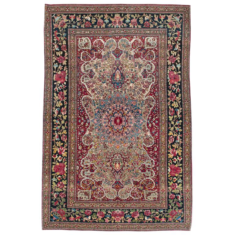 A RUG. An antique Esfahan. 212 x 141 cm.