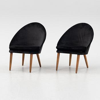 Eyvind Johansson, a pair of '391' easychairs, mid 20th century.