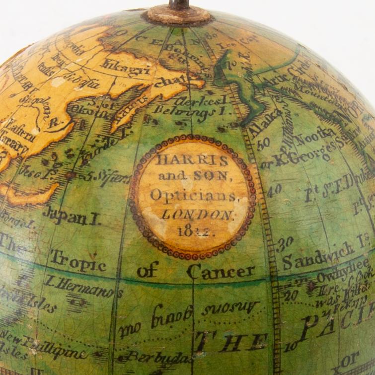 Pocket globe with case, Harris and son London 1812. Hand-coloured copper engraving on papier-mâché and plaster...