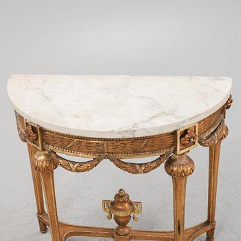 A Gustavian giltwood and marble console table, late 18th century.