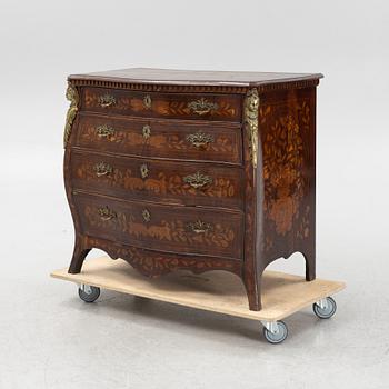 A Louis XV-style chest of drawers, late 19th Century.