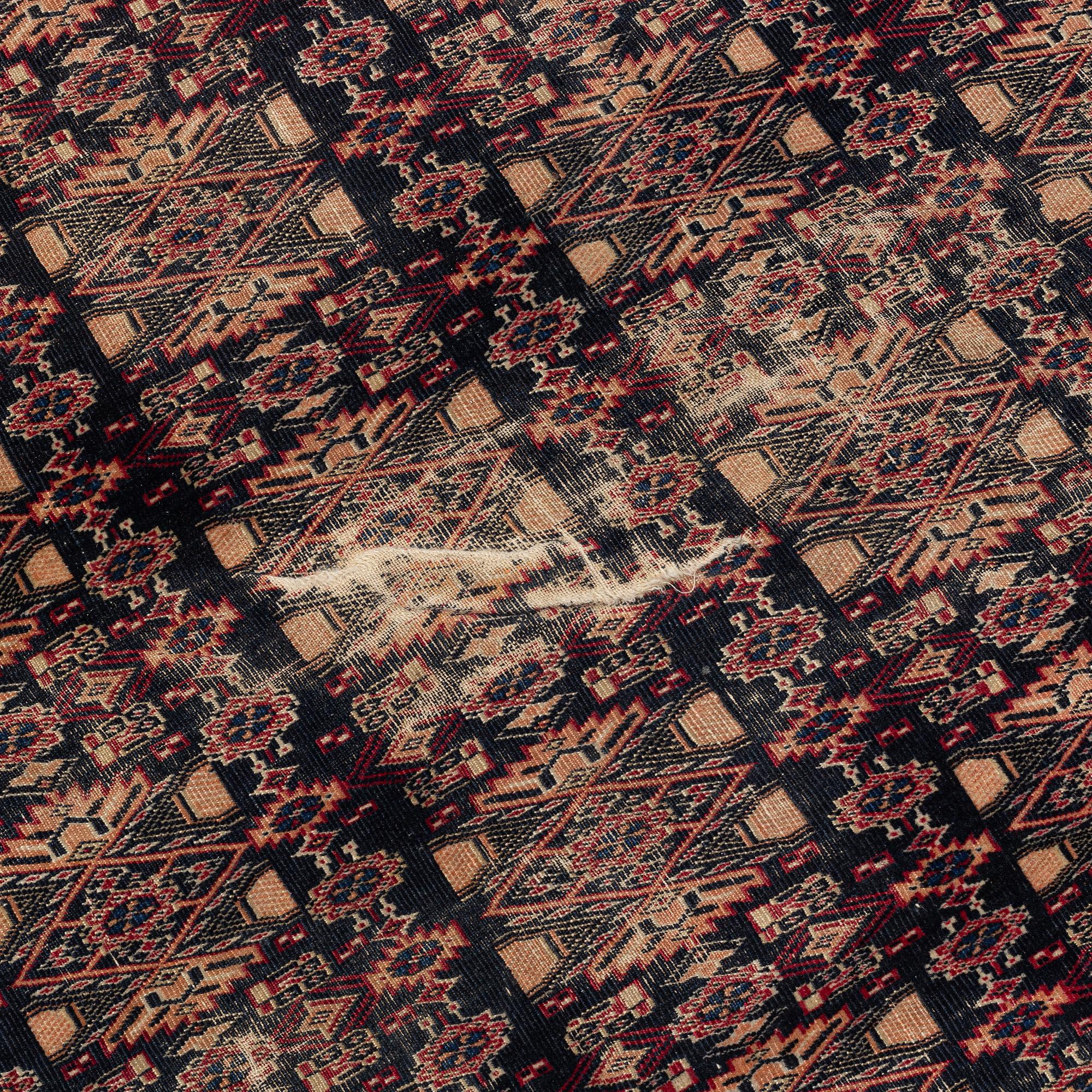 A Turkish Antique Carpet, circa 397 x 330 cm.