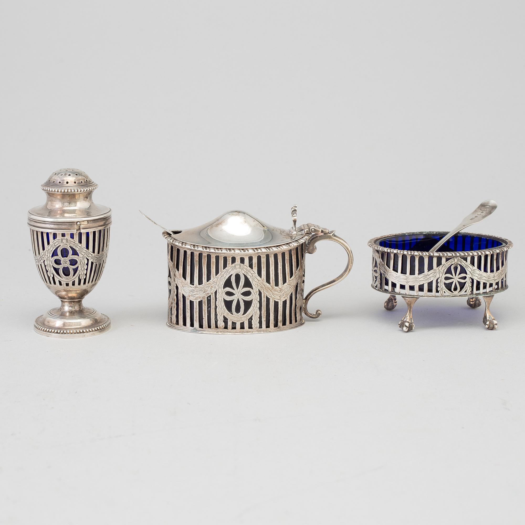 A mustard pot, a pepper pot, a salt cellar, silver, London, England, early 20th century. Weigth ca 412 grams.