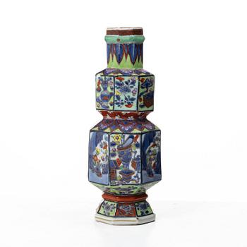 A 'clobbered' vase, Qing dynasty, Kangxi (1662-1722).