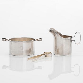 Bertel Gardberg, a silver sugar bowl, cream jug, and sugar tongs, Helsinki 1960 and Turku 1965.