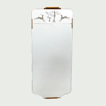 A 1940s Swedish Modern mirror.