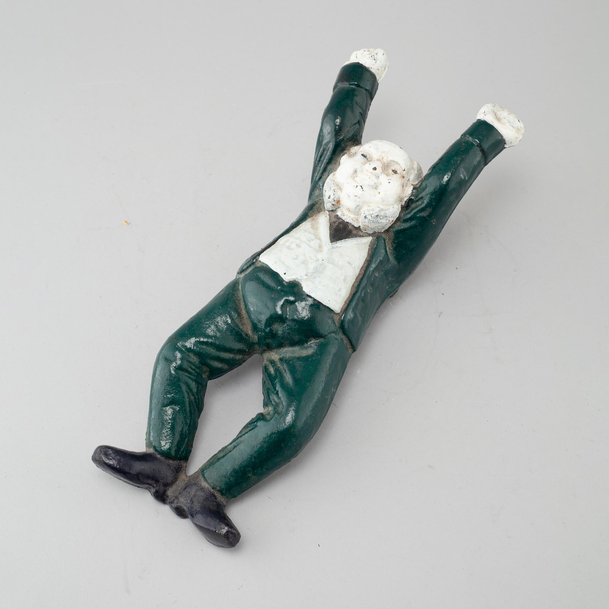 A 20th century cast iron boot jack.