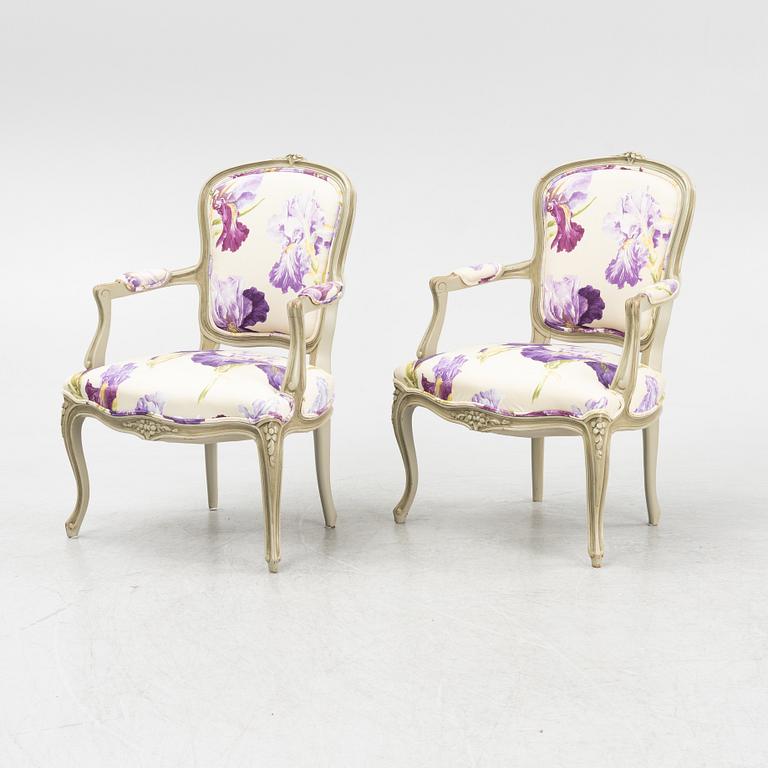 A pair of rococo style armchairs, 20th Century.