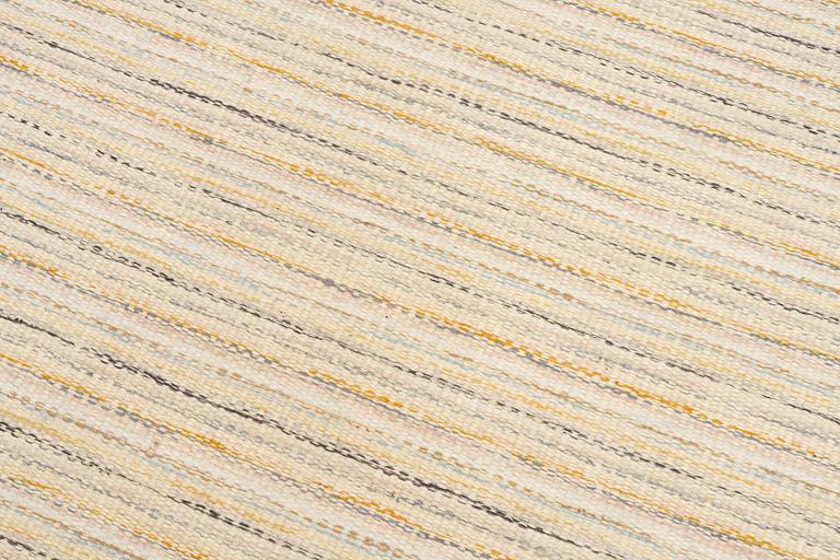 A  flat weave carpet, c. 202 x 137 cm.