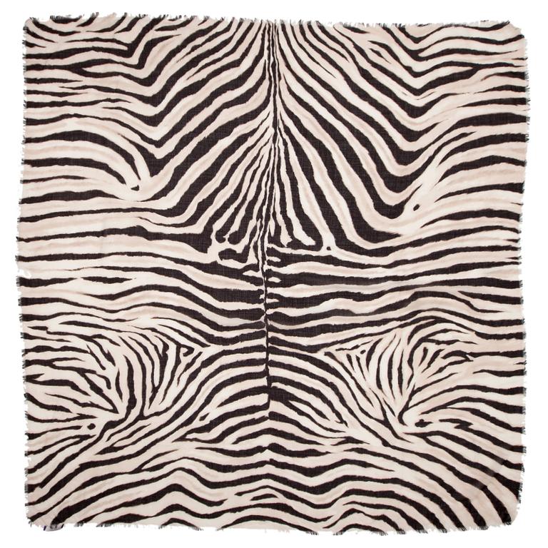 RALPH LAUREN, a zebraprinted silk shawl.
