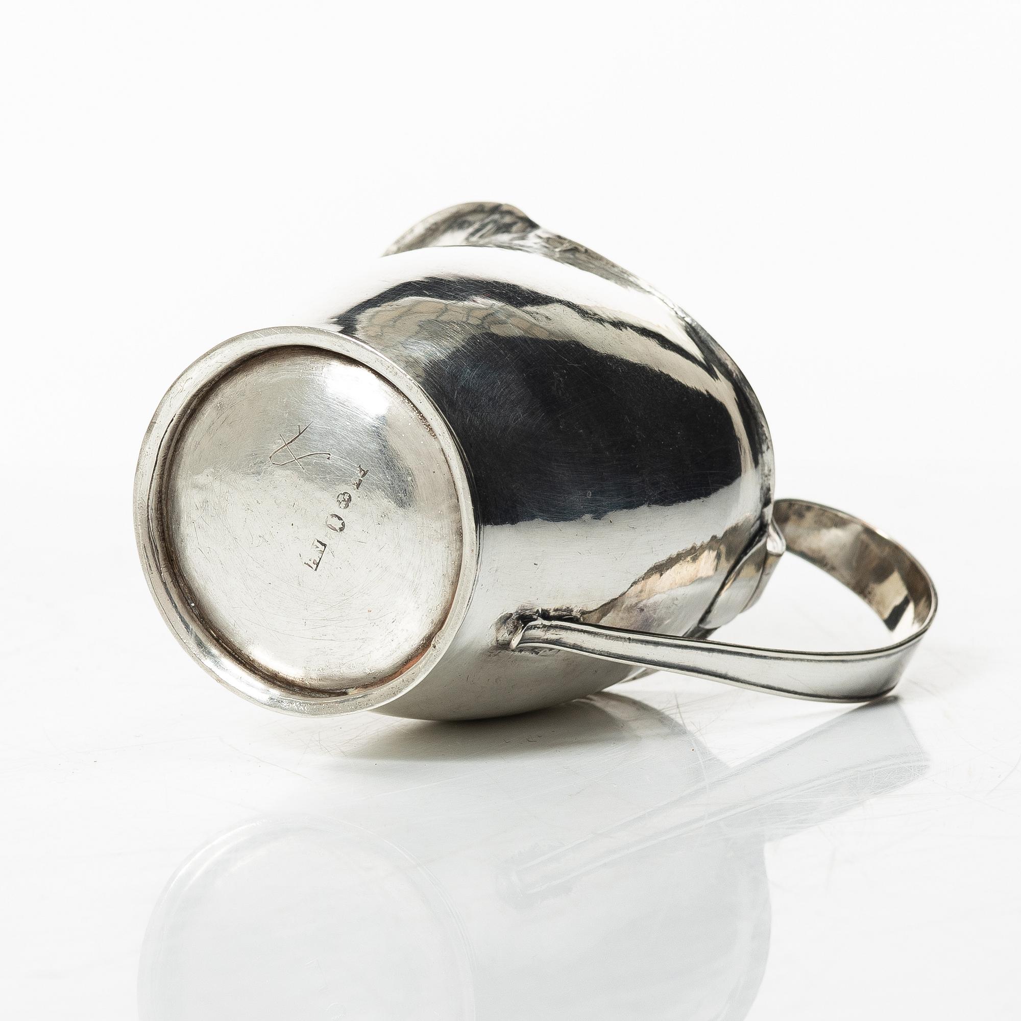 A Swedish 19th century silver creamer, mark of Nils Högrell, Stockholm 1823.