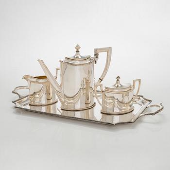 An early 20th century 4- piece sterling silver empire coffee set, C.G. Hallbergs Guldsmeds AB, Stockholm.