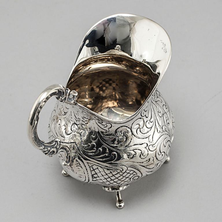 A silver sugarbowl, a cream jug and a tray by J L Hultman, Stockholm, mid 20th century.