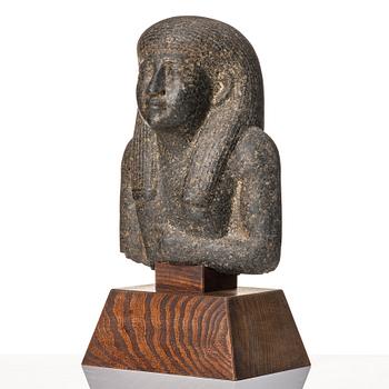 An Egyptian black granite bust of a man, 19th century or older.