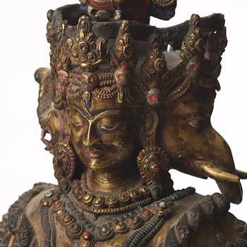 A large Tibetan eight armed deity, probably 20th Century.