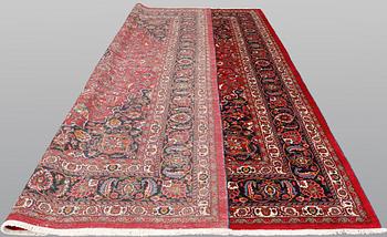 A signed Mashad carpet, ca 375 x 303 cm.