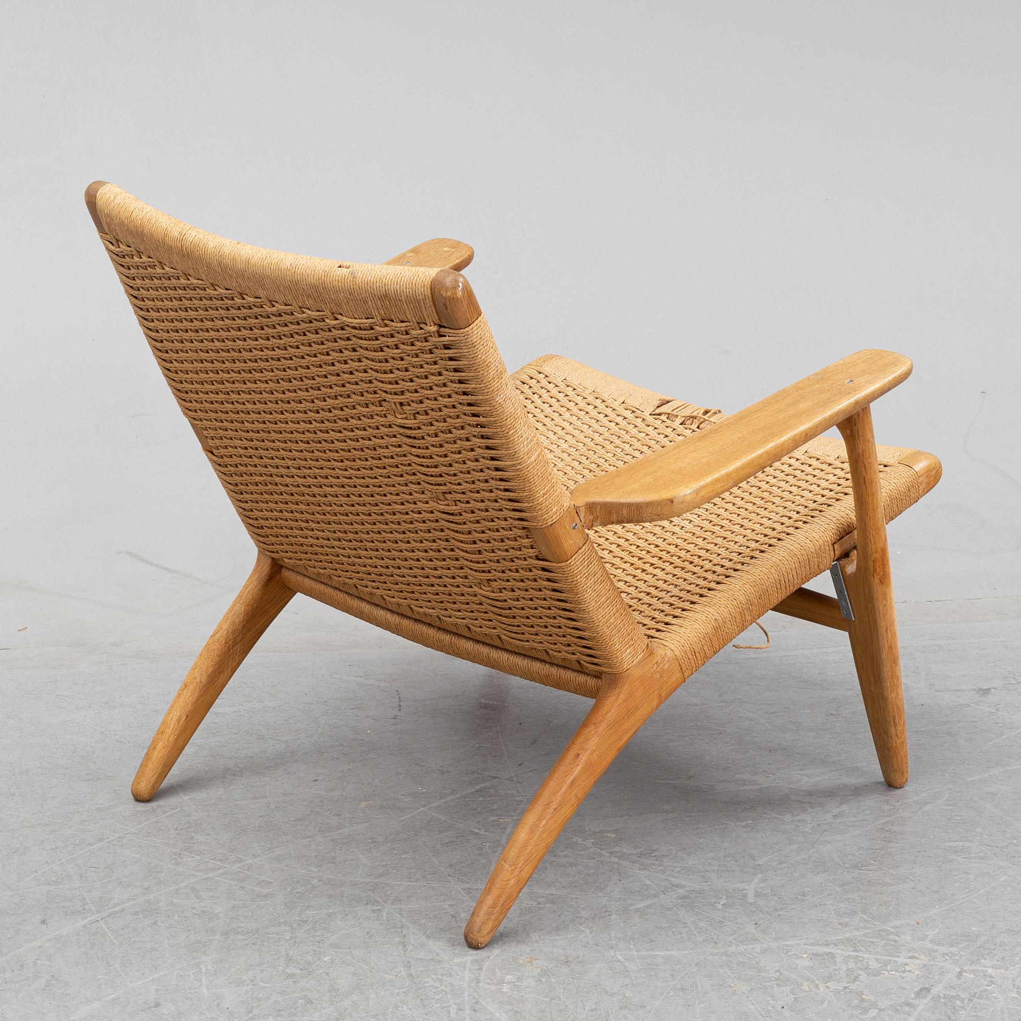 A 'CH-25' armchair designed by Hans J Wegner for Carl Hansen & Søn, Denmark.