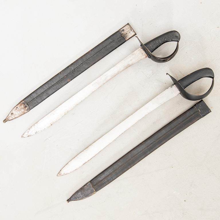 Two Swedish cutlasses 1851 navy pattern.