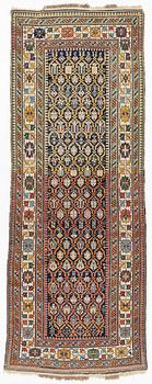 An antique Shirvan runner, circa 313 x 116 cm.