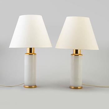 A pair of glass table lights by Luxus.