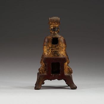 A brons figurine in the shape of The Jade Emperor, Yu Huang, late Ming dynasty (1368-1644).