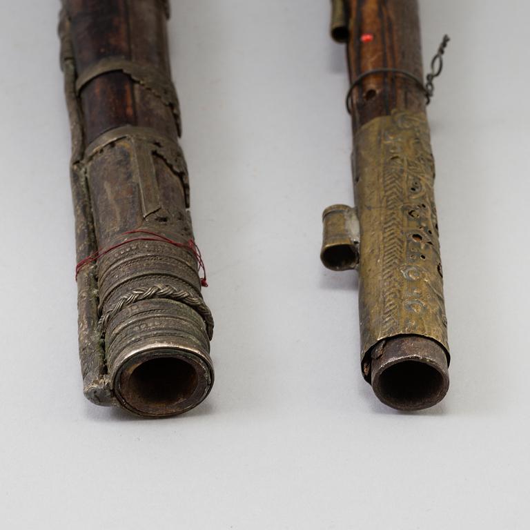 Two 19th century flintlock pistols.