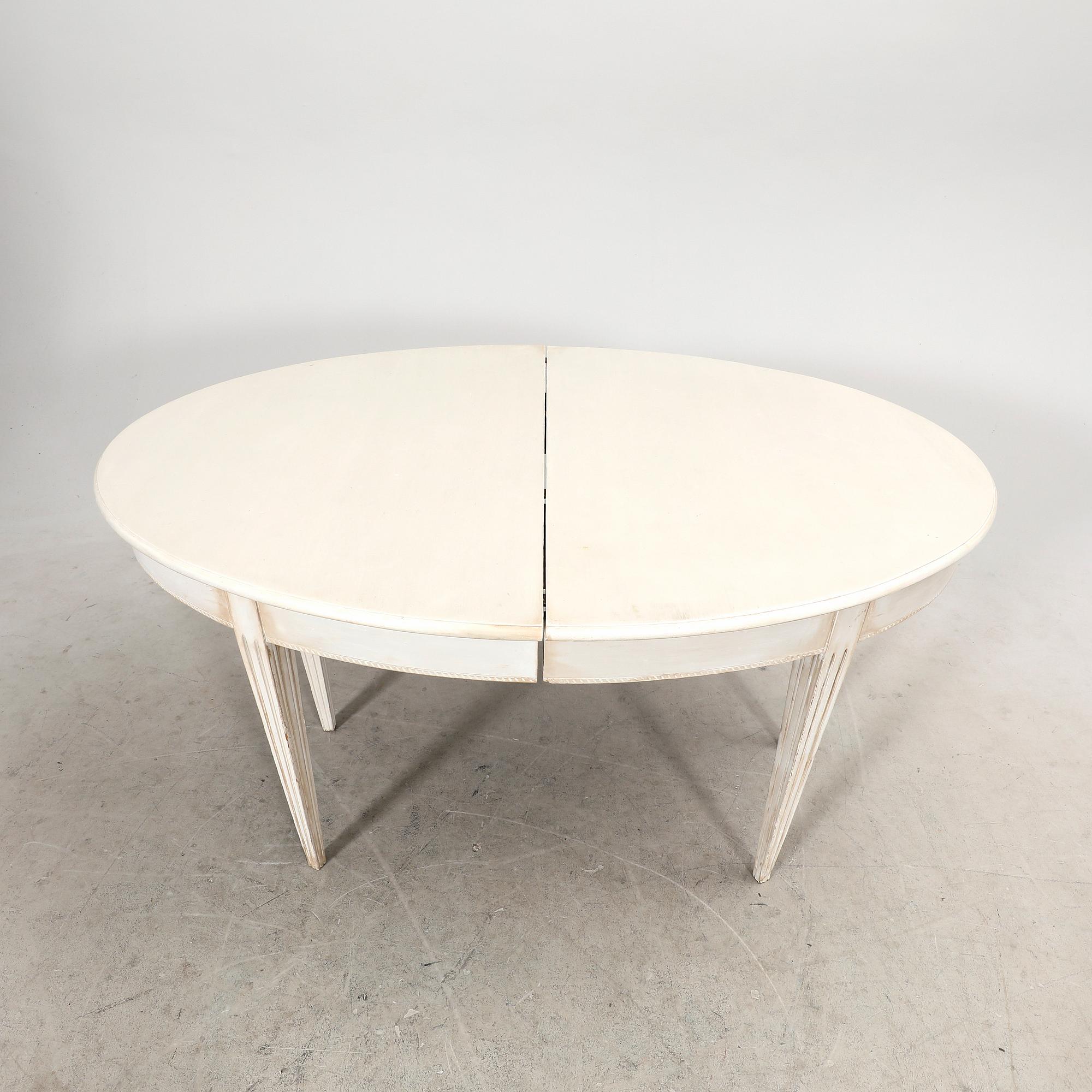 A painted 19th/20th Gustavian style dining table.
