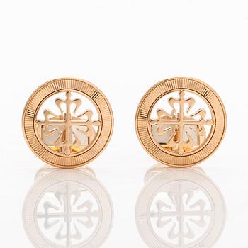 Patek Philippe, a pair of 18K gold "Calatrava" cufflinks.