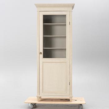 Display cabinet, early 20th century.