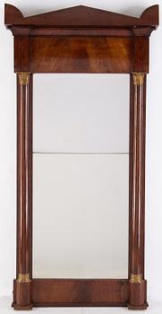 An Empire mirror and console table, first half of the 19th century.