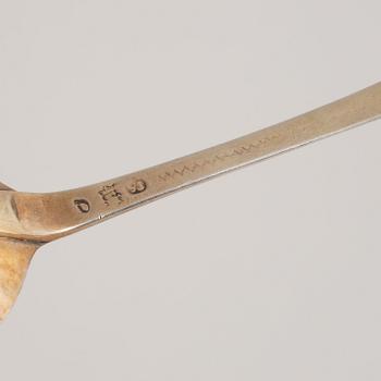 A gilt silver serving spoon by Gustaf Stefhell, Stockholm, Sweden, 1740.