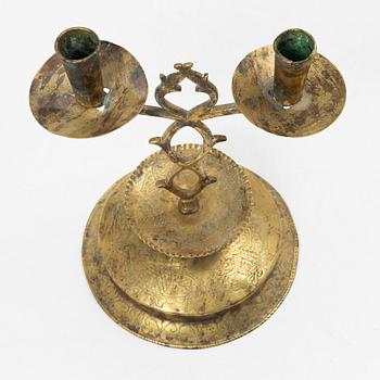 A Swedish brass two-branch candlestick, 18th/first part 19th century.