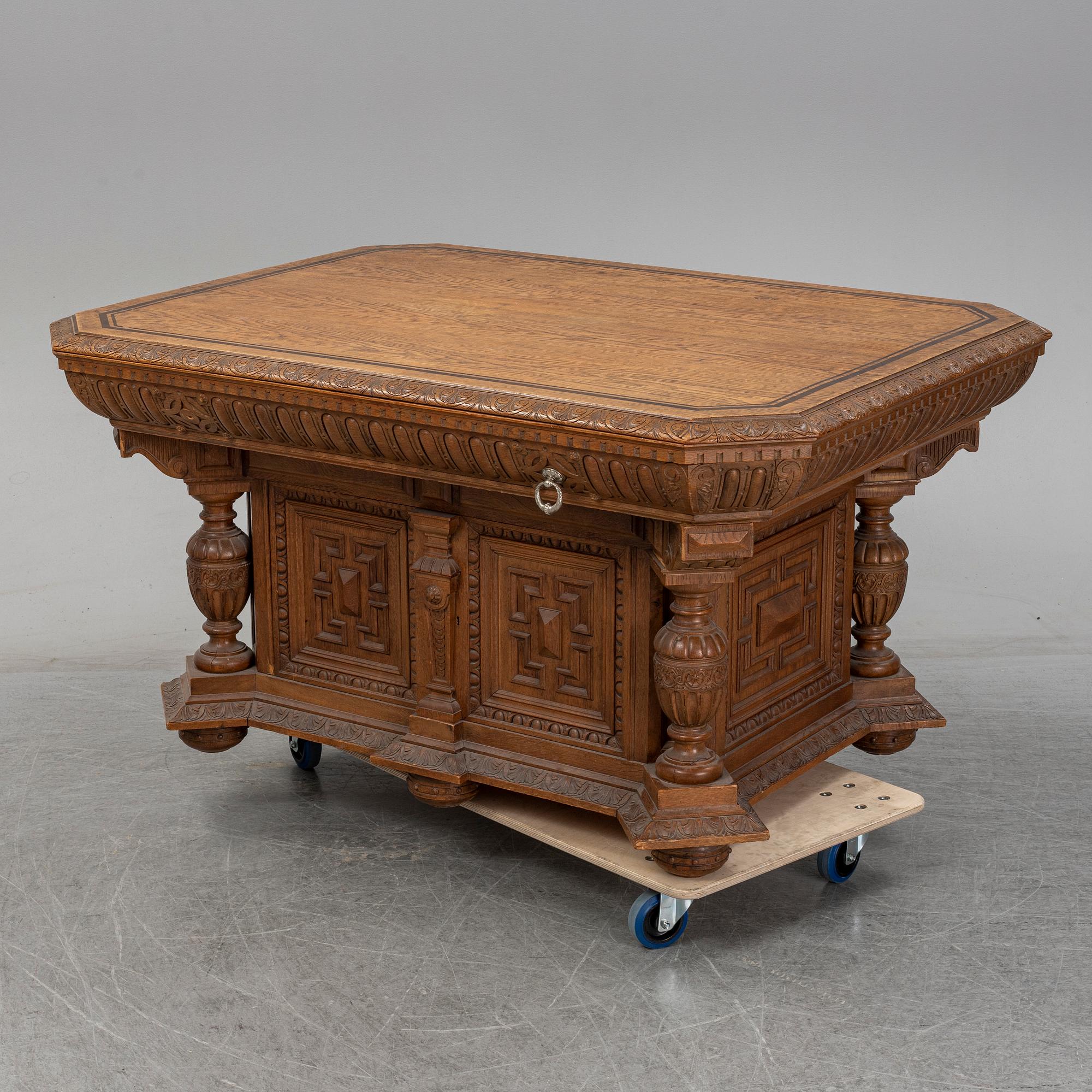 An oak library table, 1890's.