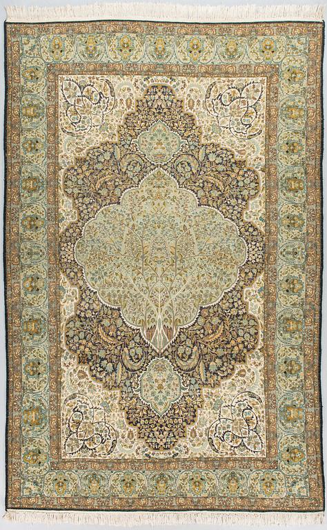 An old part silk oriental rug, ca 278 x 178 cm.