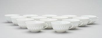 A RICE GRAIN PORCELAIN SET OF TEA CUPS BY FRIEDL HOLZER-KJELLBERG, 18 pcs, signed Arabia F.H-Kj Finland.