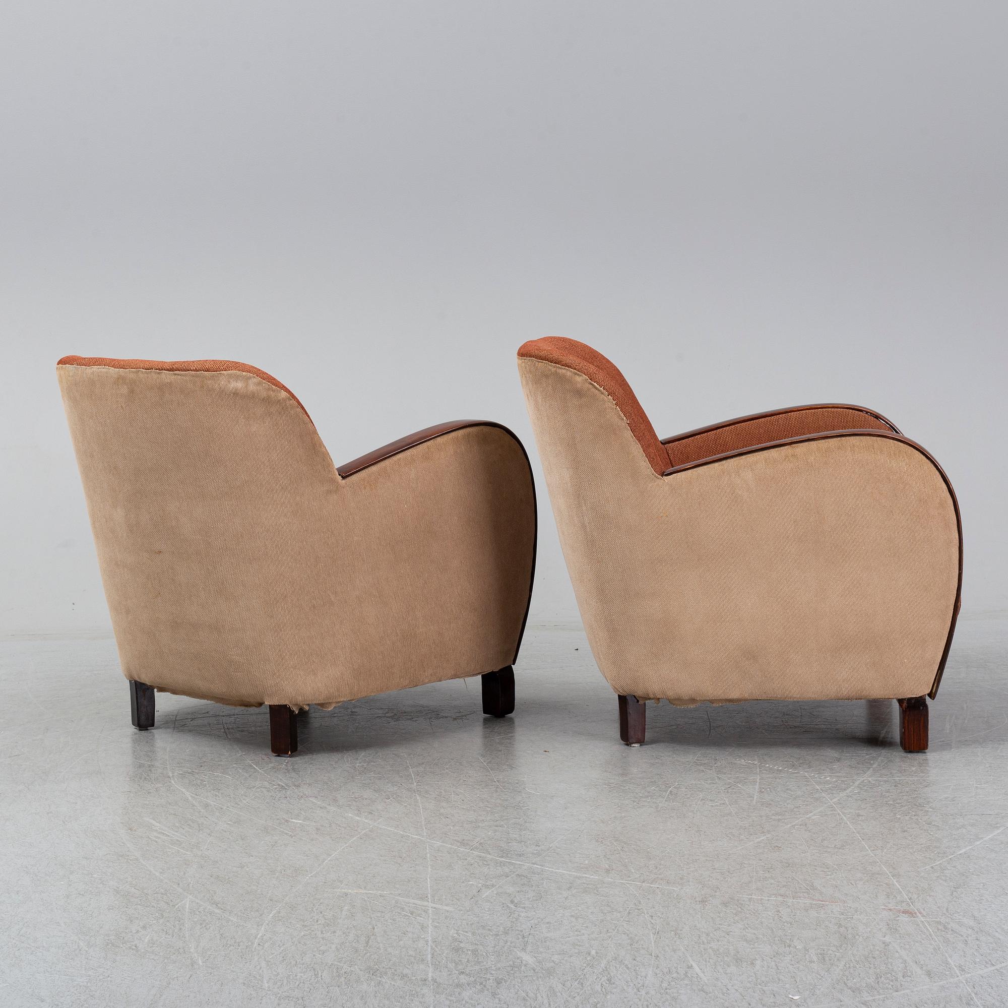 A pair of 1930's easy chairs.