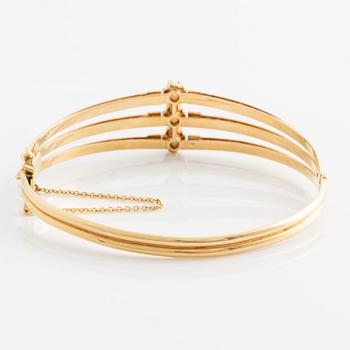 Bracelet, three-row rigid with pearls, 18K gold.