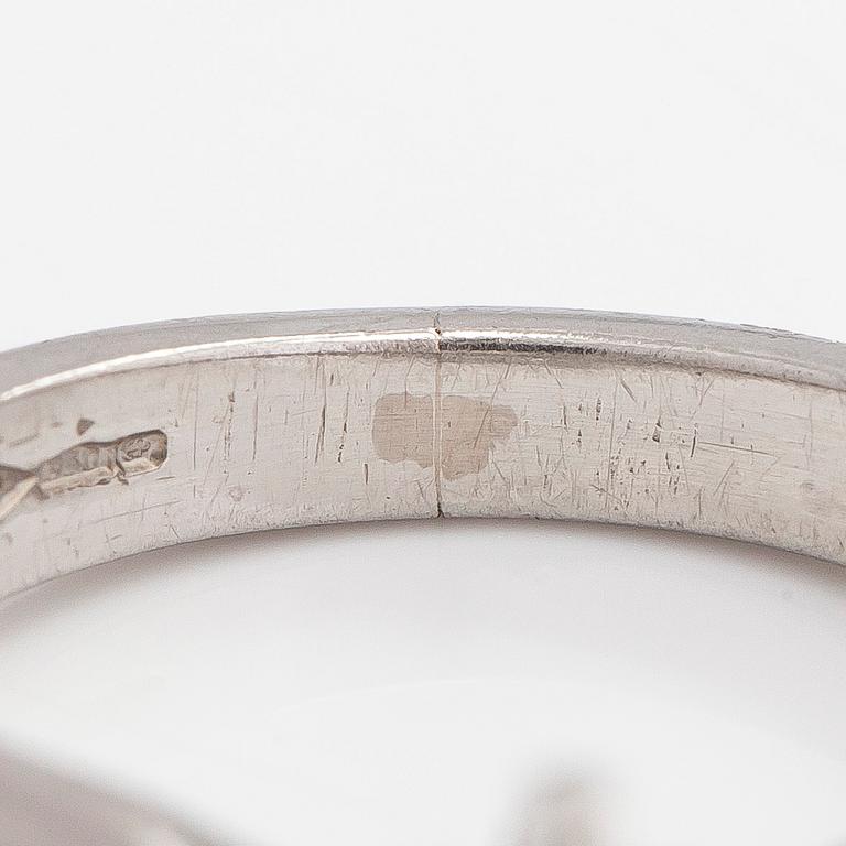 A platinum ring, with a brilliant-cut diamond approximately 3.10 ct. Domino Jewellery, Birmingham, England.